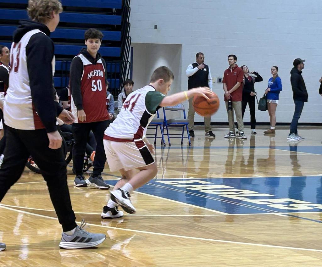 Unified basketball player bouncing ball