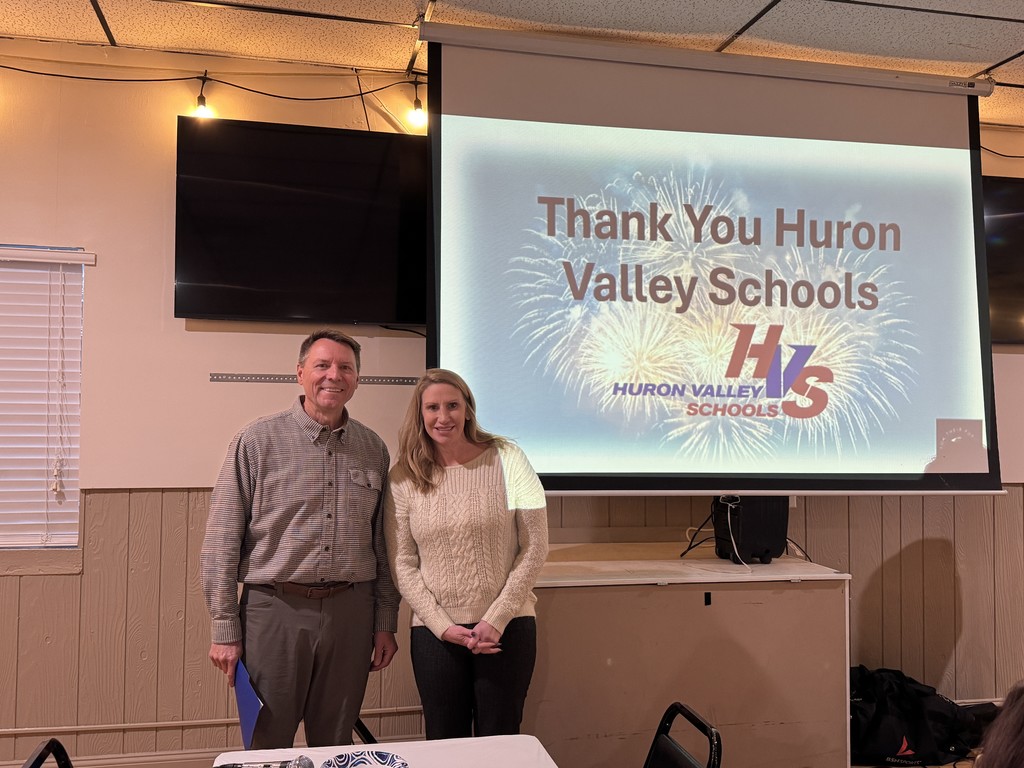 Representatives from HV Bank and Huron Valley Schools 