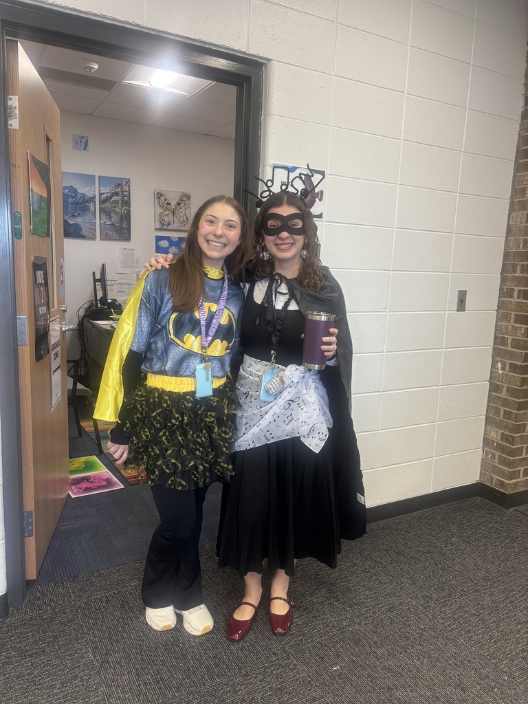 staff dressed as superheros