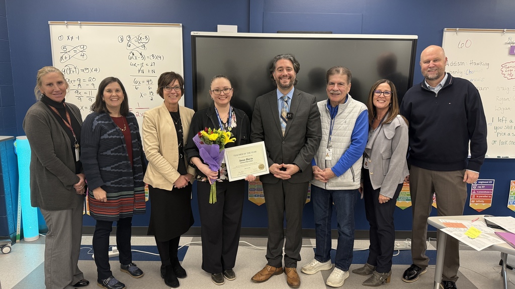 Huron Valley Schools High School Teacher of the Year... Anna Bovio from Lakeland High in her classroom with administrators