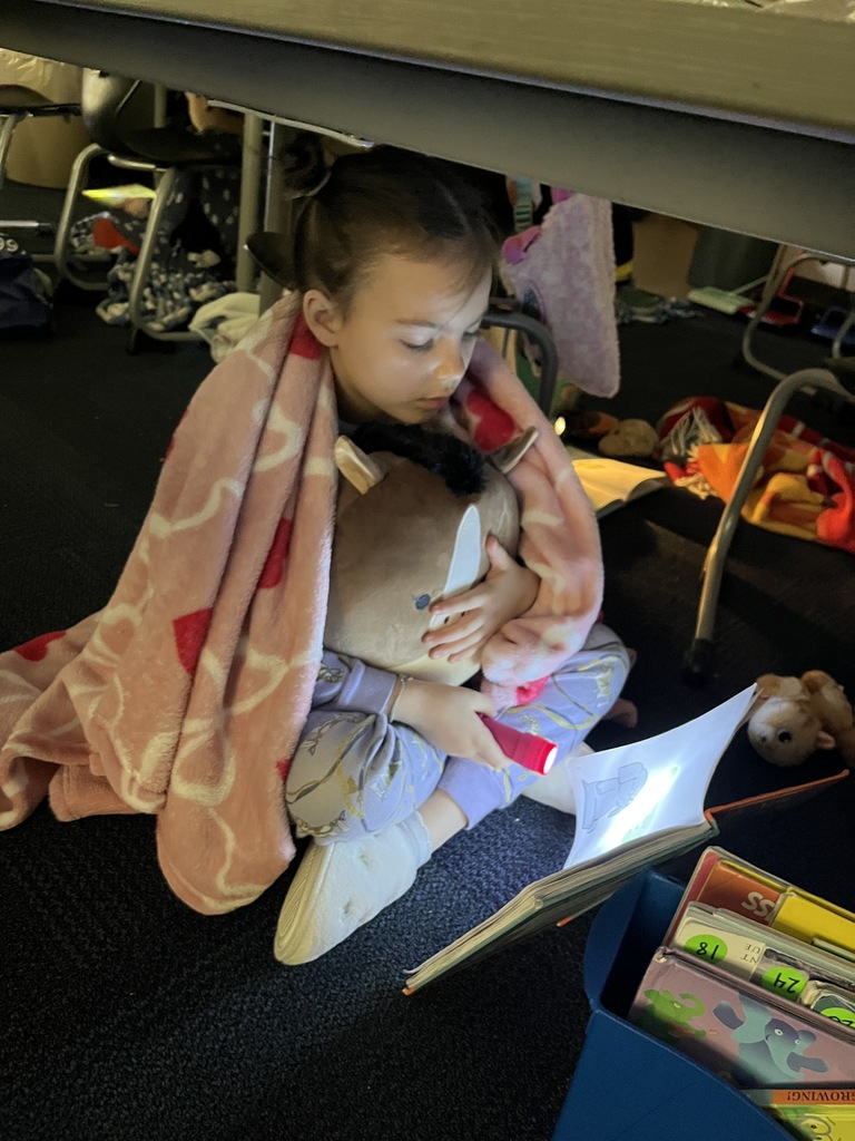 reading with flashlights is always fun!