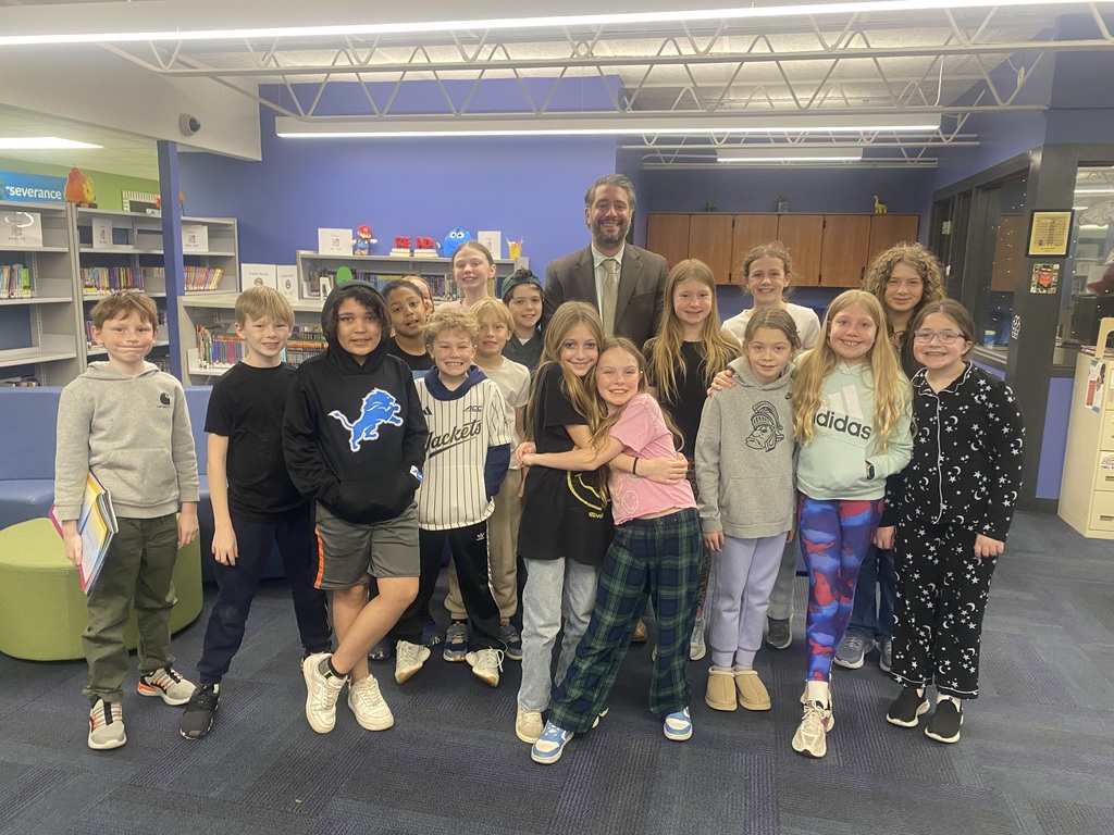 Picture of Supt. Paul Salah and several 4th graders from Johnson Elementary posing for photo