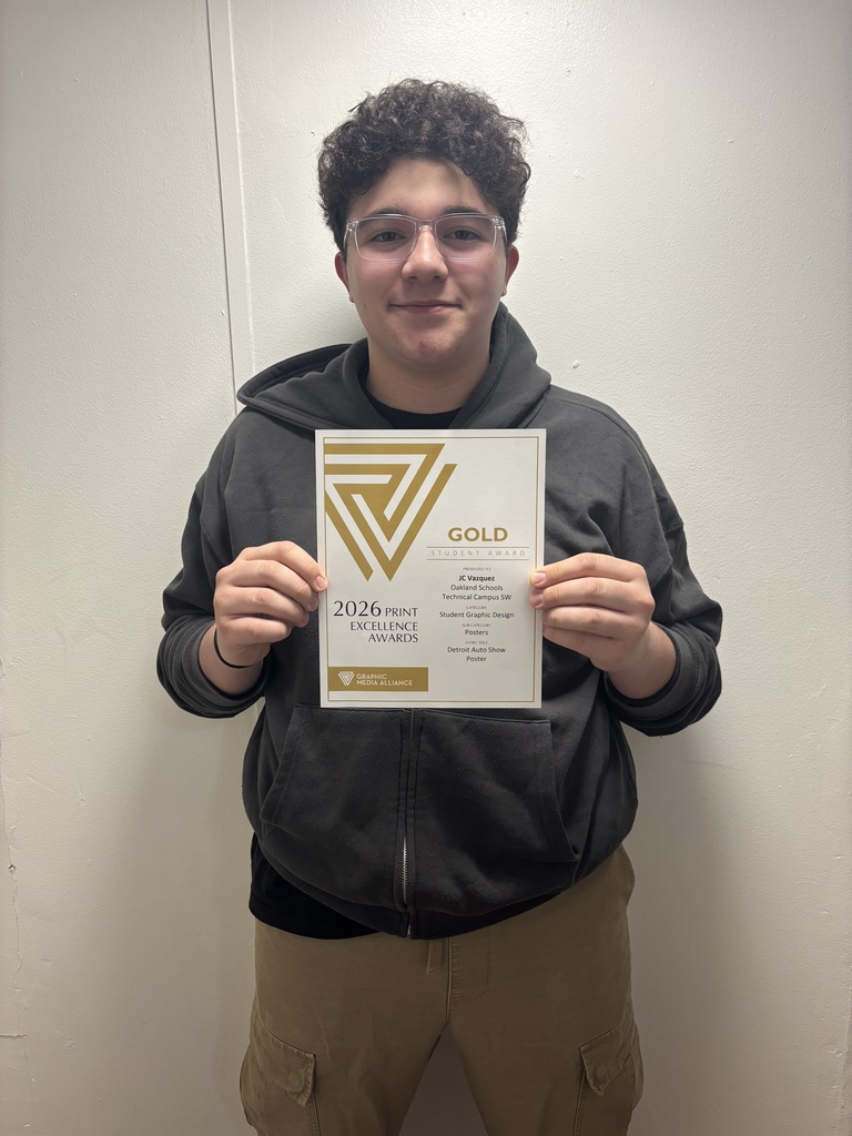 Picture of JC Vazquez holding his award