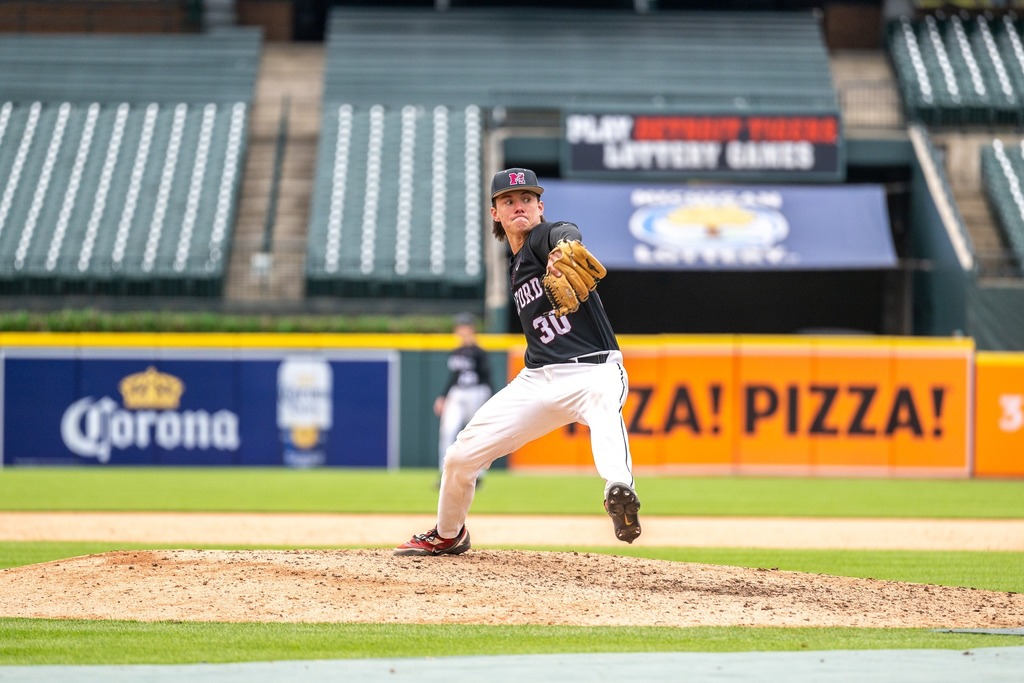 mhs pitcher winding up for a pith on the mound at comerica park 