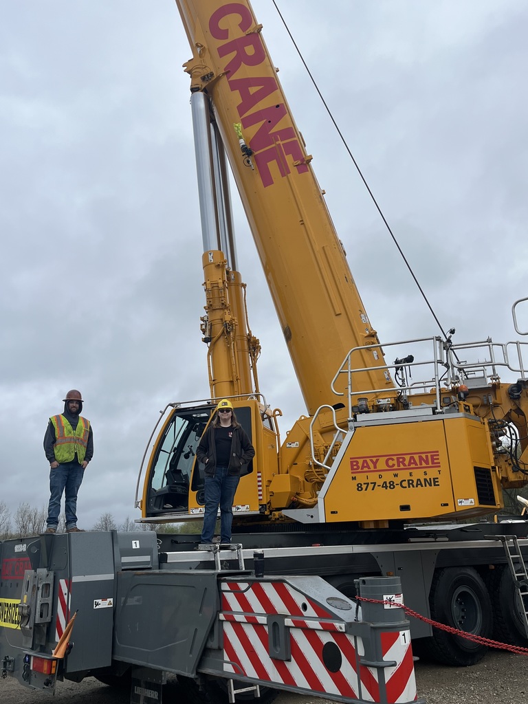Standing on a crane