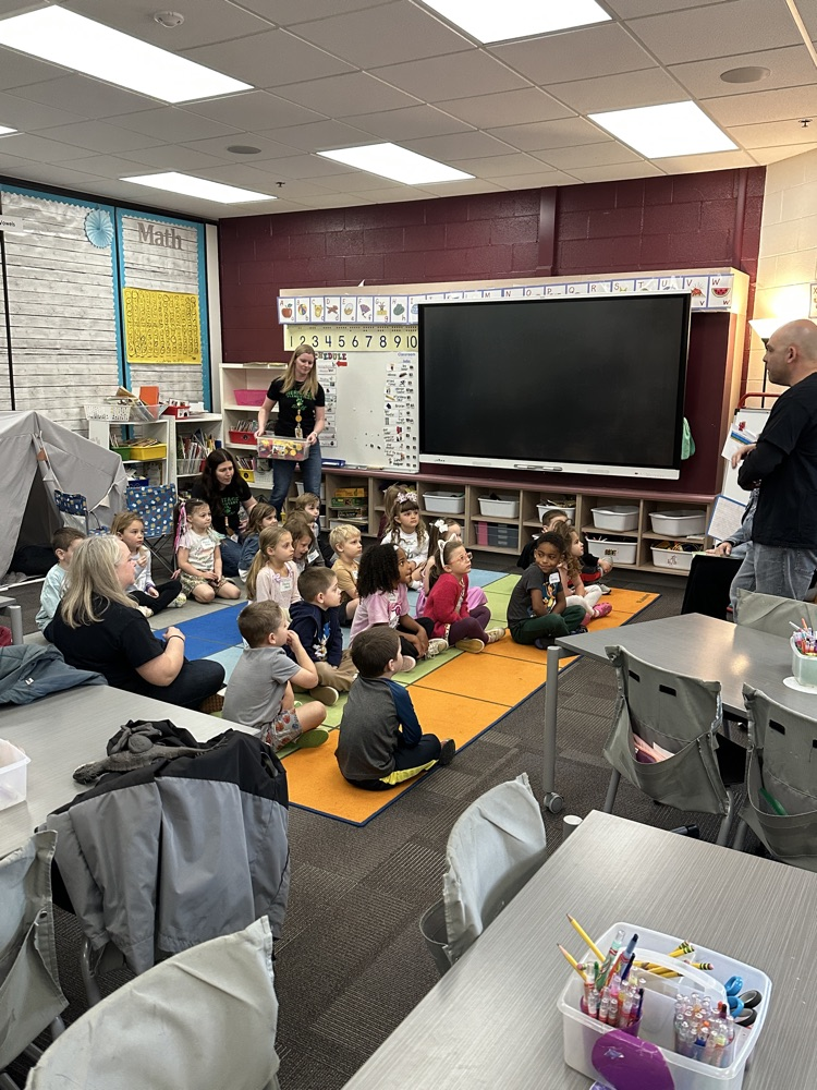 k day students listening to a story