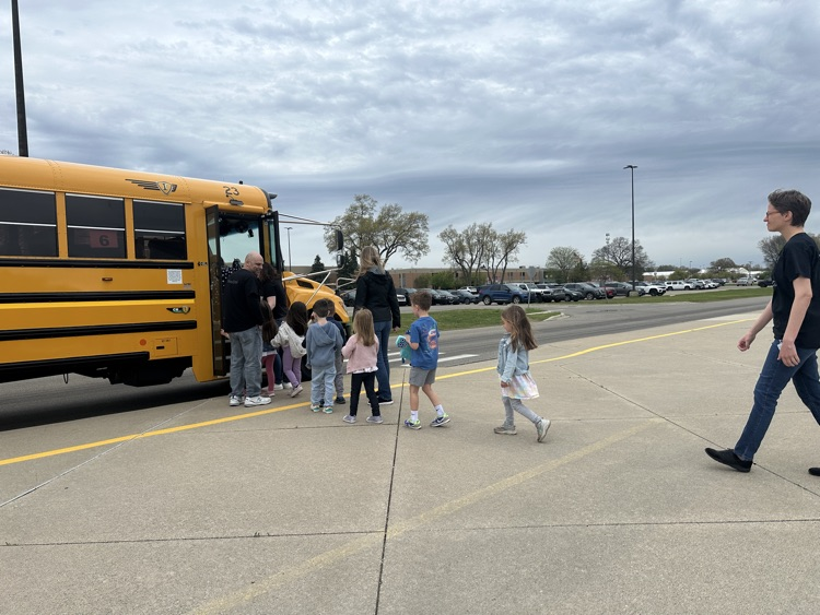 k day students walking to bus