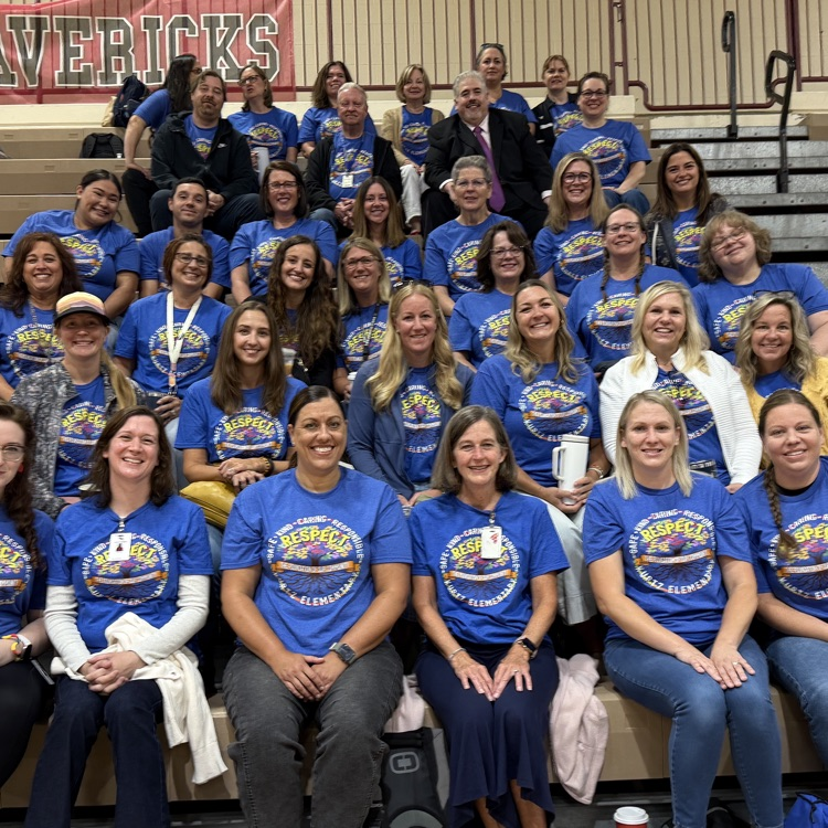 opening day crowd and teachers in gym.