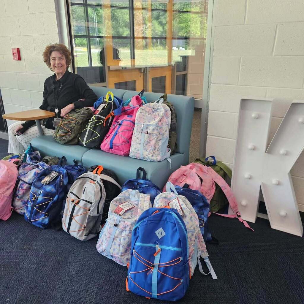 Kurtz student from the past donates backpacks with supplies.