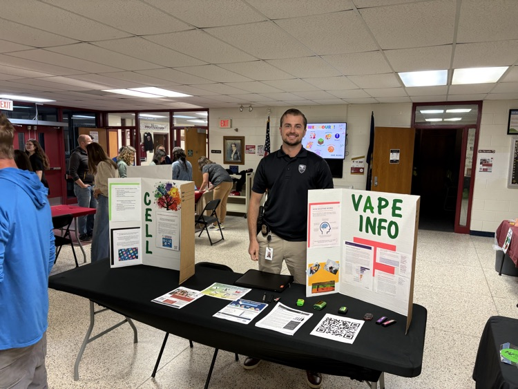 safety and health information at a table for parents about cell phones and vapes