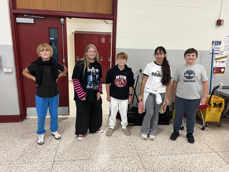 5 students stand for fundraising photo
