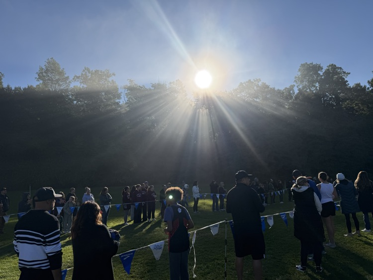 parents line the race trail to cheer for runners