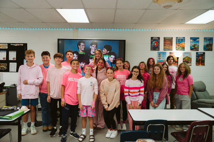 group photo of students in pink
