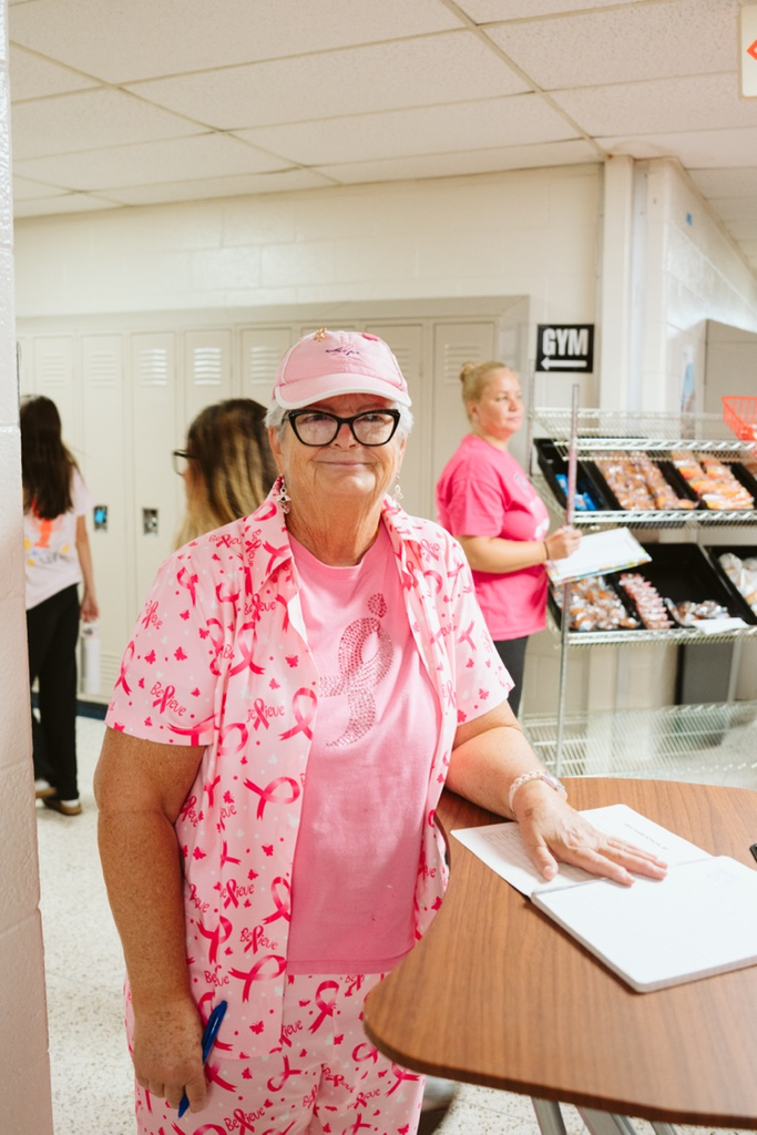 school staff wearing pink