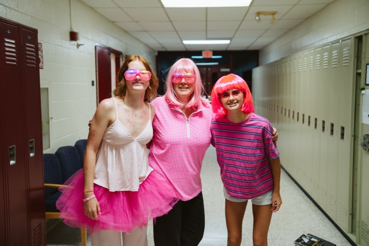 group photo of students in pink