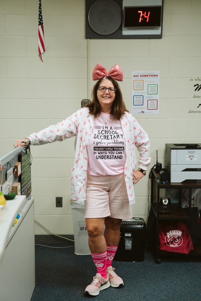 school staff wearing pink