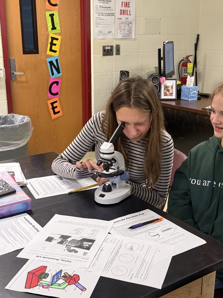 students use microscopes