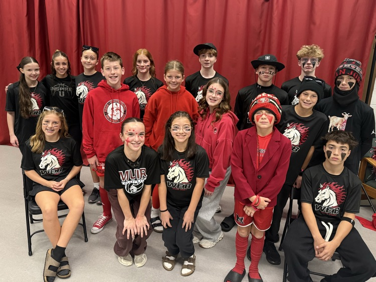 group of students in school colors of red and black