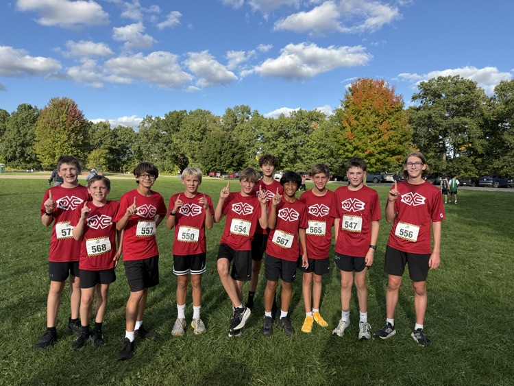 group of cross country runners in red