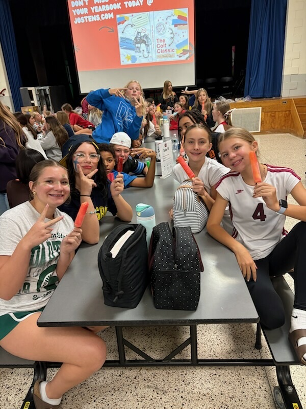 students eating popsicles in the cafeteria 