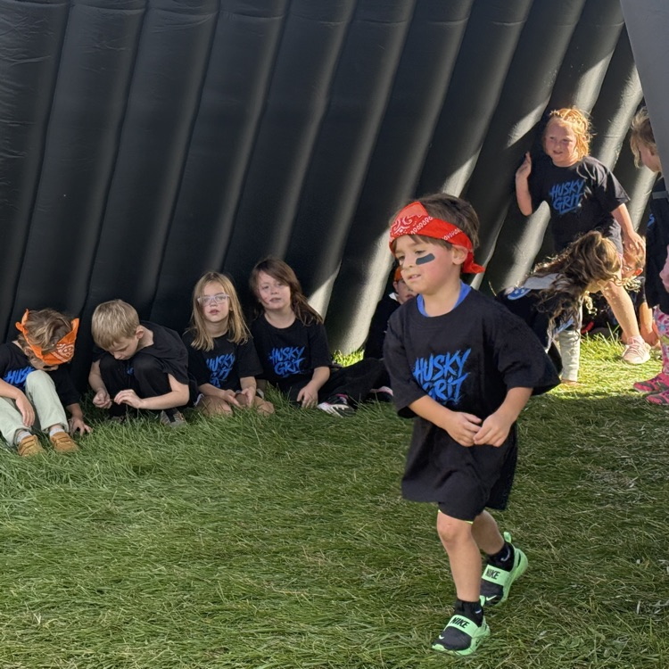 young student running outdoors