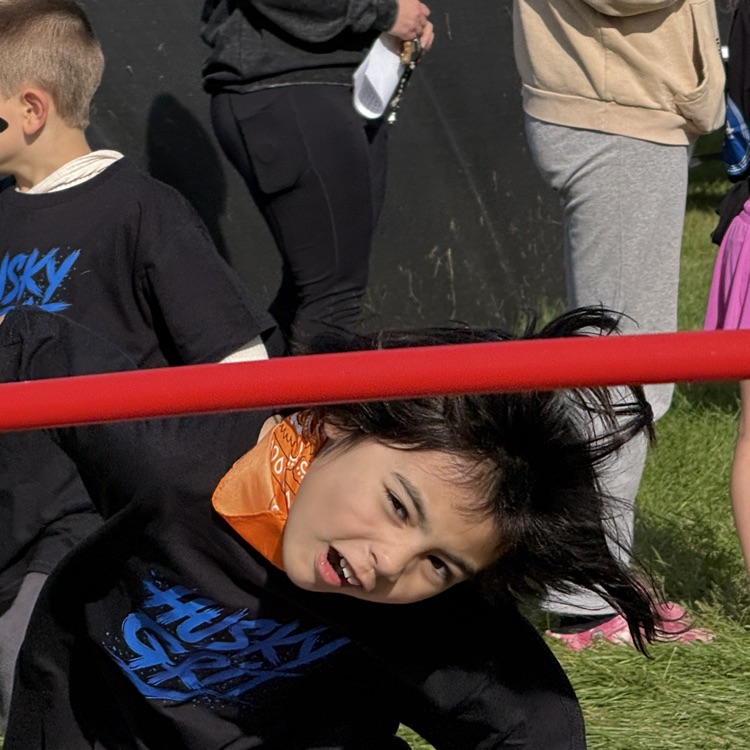 young student running outdoors