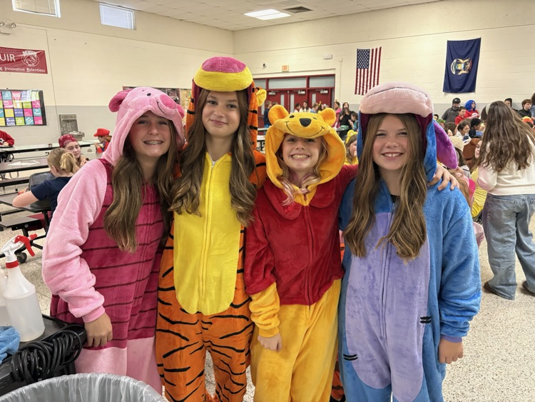a group of students in Winnie the Pooh costumes 