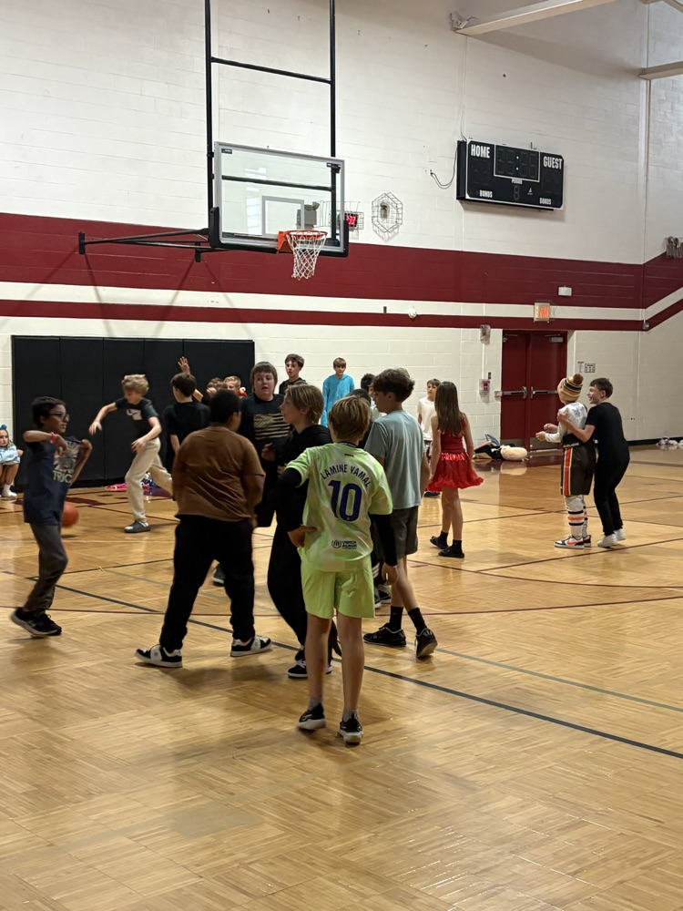 students play in the gym at the Halloween dance 