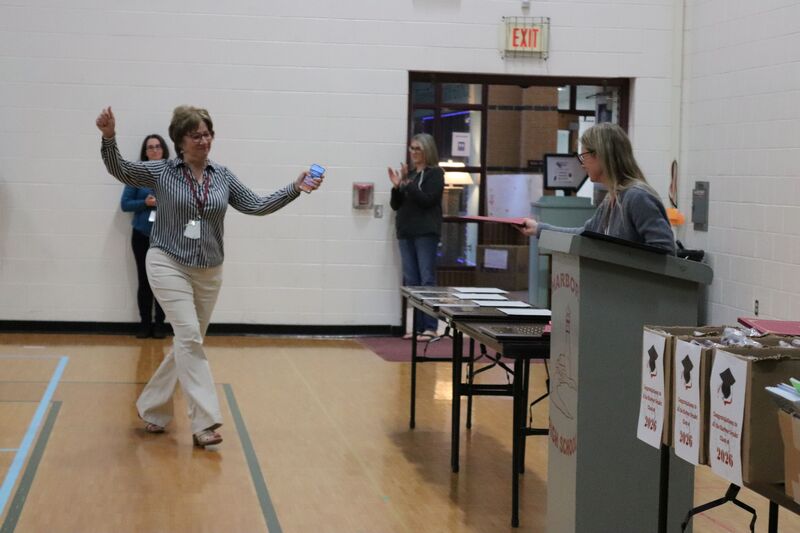 Mrs. Best presents an award to Ms. Diana