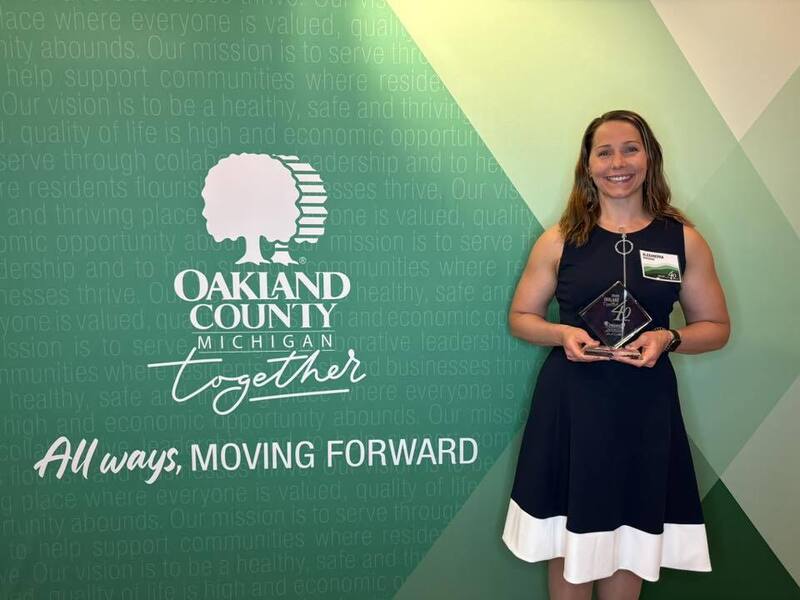 Alexandria Bingham, Class of 2008, with her award.