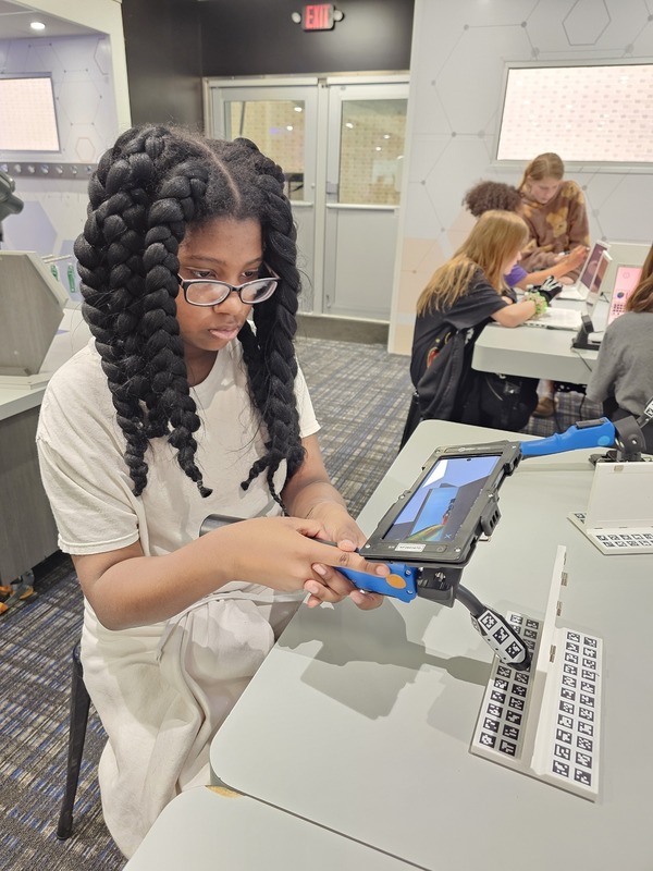 student using laptop during STEM Session