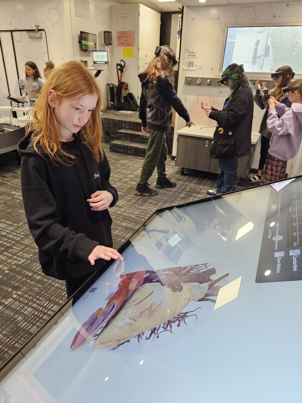student using touchscreen computer during STEM Session