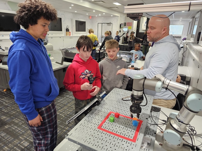 student watch robot during STEM Session