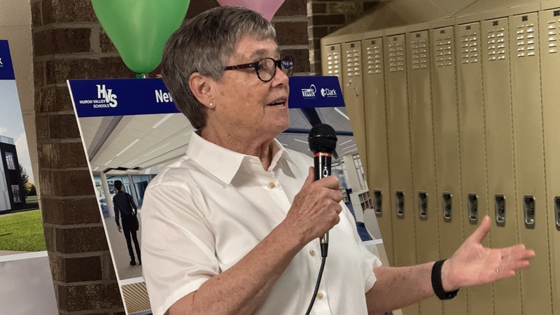 hvs school board member Lindsay Cotter speaking at event