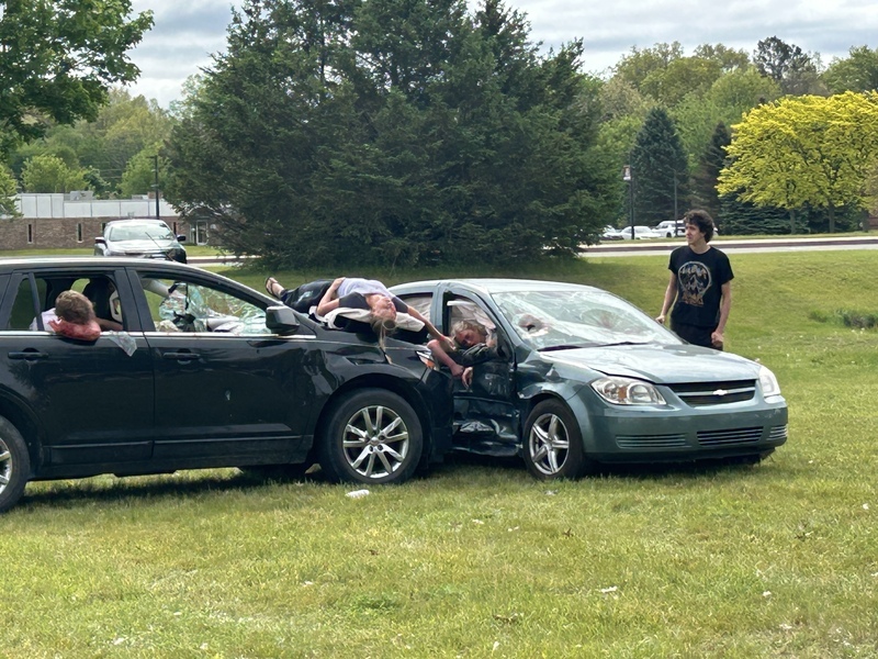 two cars crashed together during mock car crash simulation event