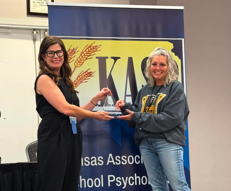 jennifer bain (right) receives award for school psychologist of thear year