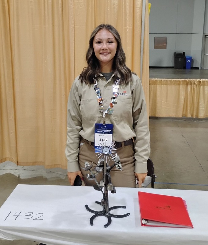 Left to Right: Glenna Burden, Harlie Terrell, Chyanne Myers, Tanner Loushrie, Jeremiah Harmon, and Blake Beaumont in the Georgia World Congress Center for the SkillsUSA National Leadership & Skills Conference. Atlanta, GA