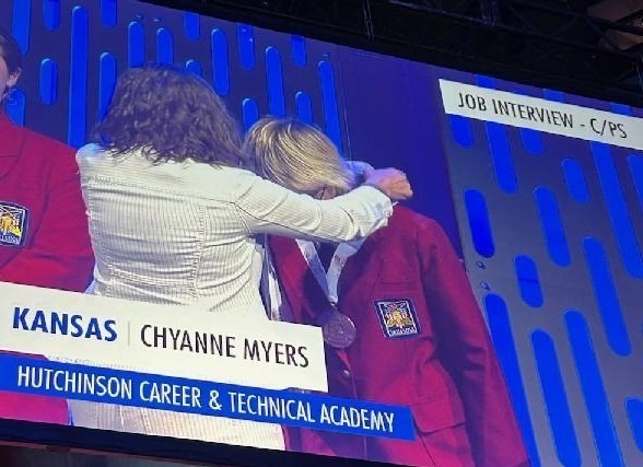 Chyanne Myers receiving her bronze medal.
