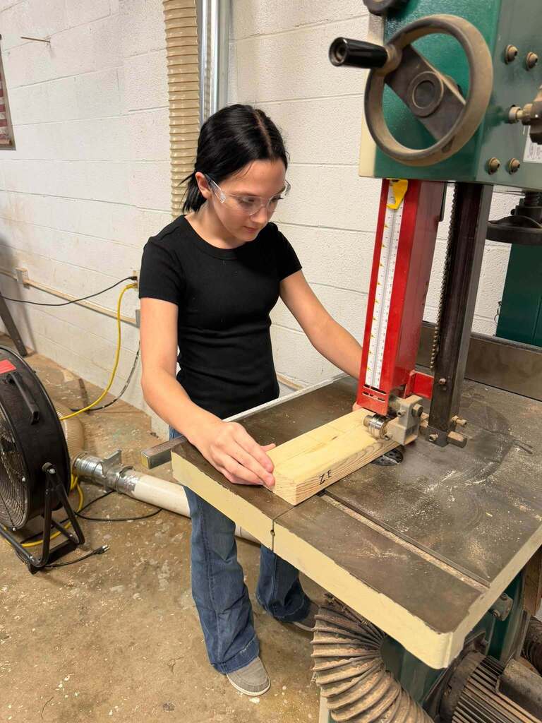 Junior High Ag. has been busy learning to work with some of the machines in the shop.  The past week they have been using the bandsaw, miter saw, table saw, drills and sanders.   The best part of Friday was watching the kids line up to take the picture! 