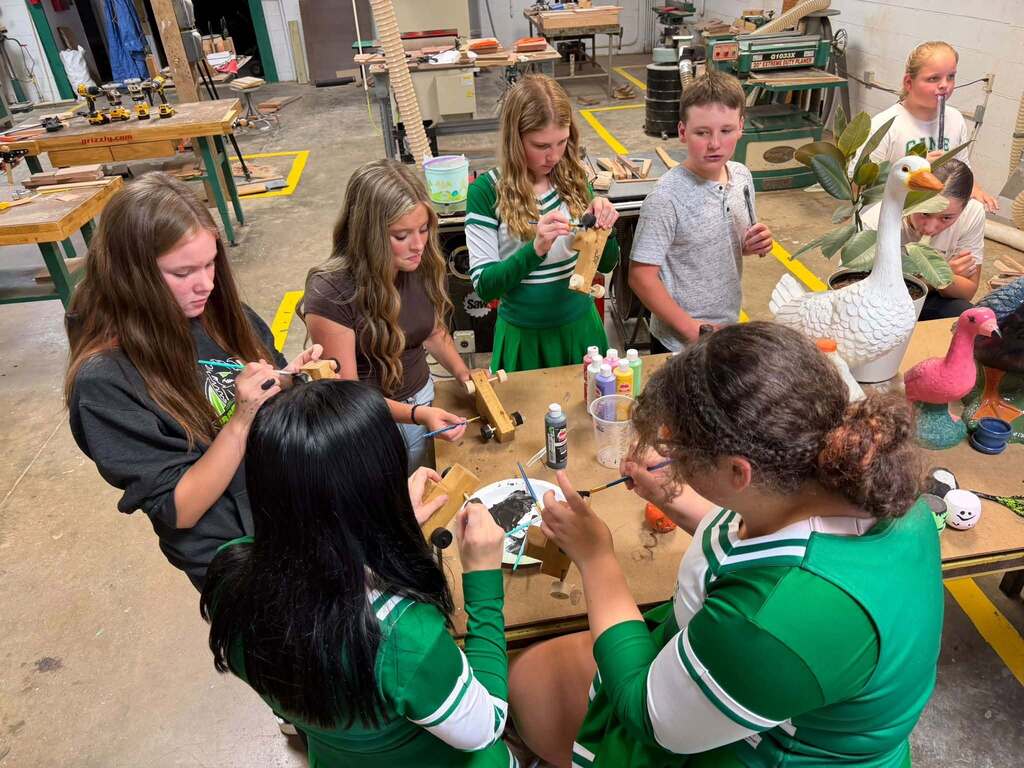 Junior High Ag. has been busy learning to work with some of the machines in the shop.  The past week they have been using the bandsaw, miter saw, table saw, drills and sanders.   The best part of Friday was watching the kids line up to take the picture! 
