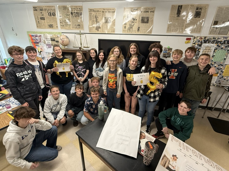 Sydney Argo and Carrie Yana-White and students 