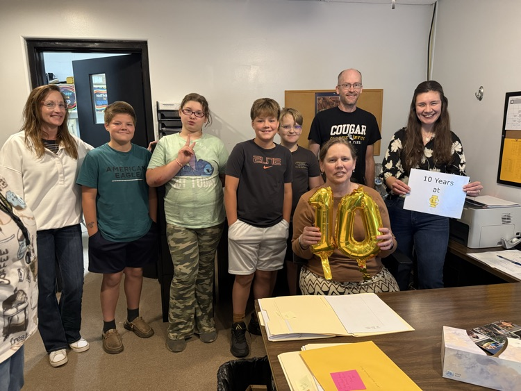 Suzette Atwood and students and staff