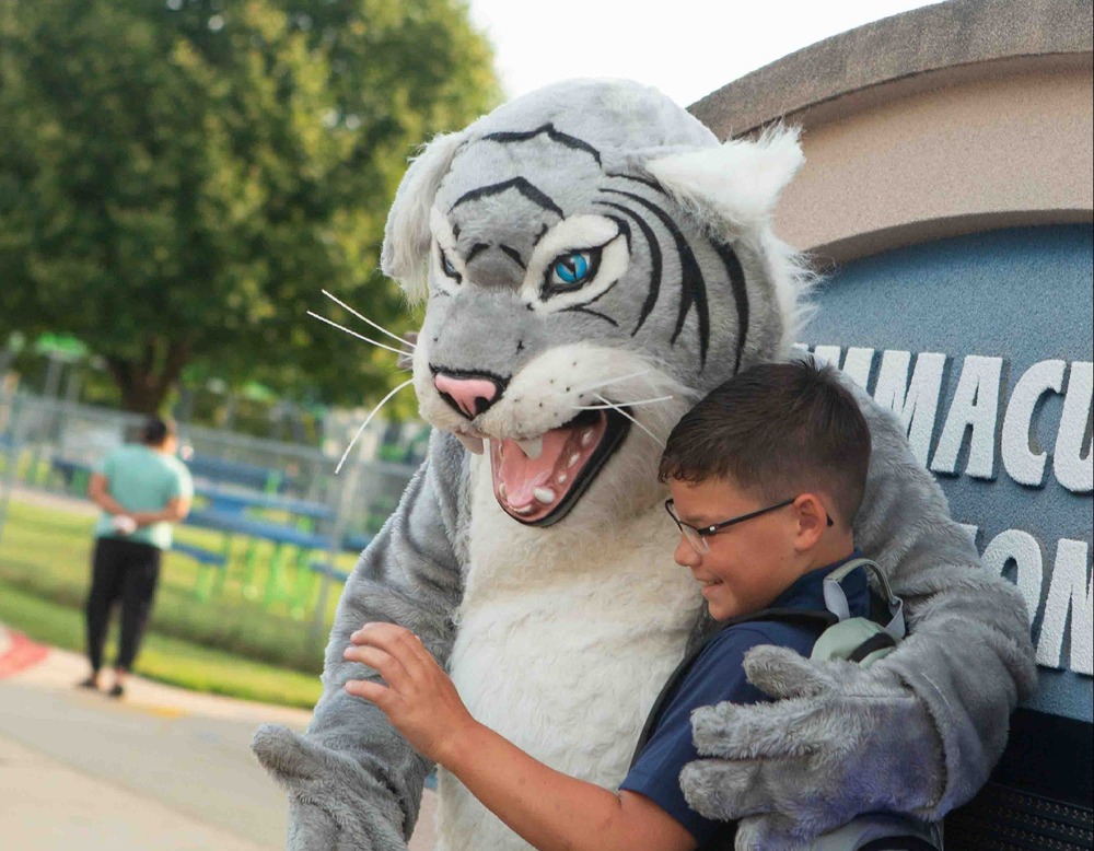 Picture of wildcat and smiling boy