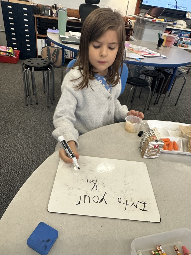kids eating and writing