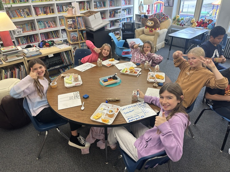 kids eating and writing