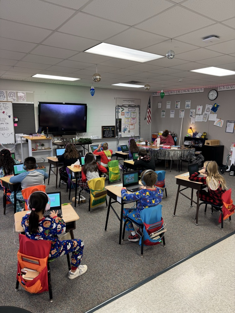 class working on Chromebook