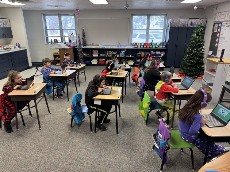 class of students working on computer