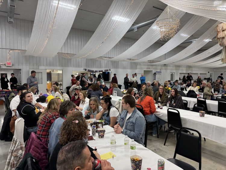 group eating at a long table 