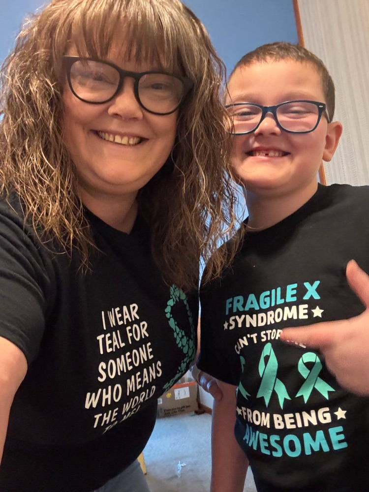 mom smiling with boy smiling