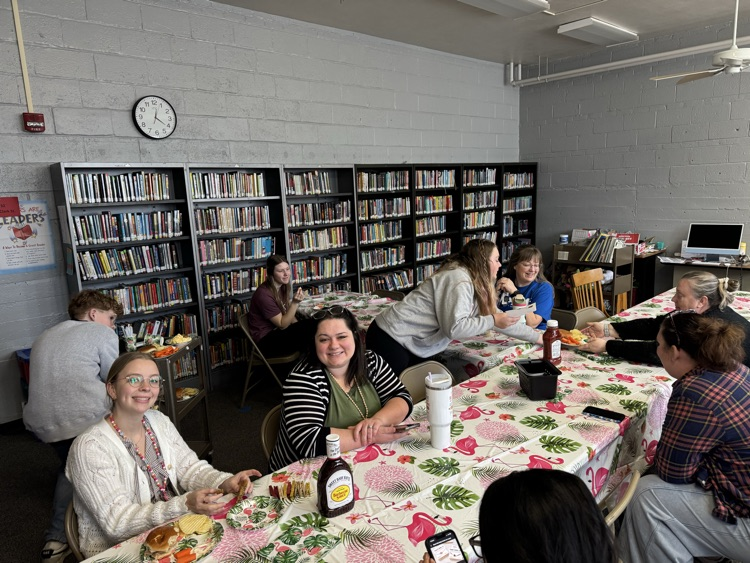 teachers eating at flamingo table